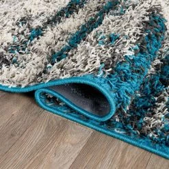 Turquoise 5 ft. x 7 ft. Modern Abstract Design Plush Shag Area Rug by World Rug Gallery -Shaw stor online turquoise world rug gallery area rugs 466turquoise5x7 c3 1000